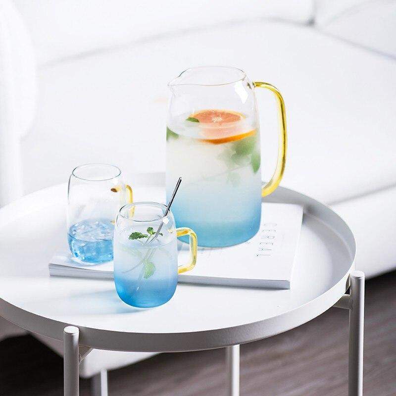 Blue glass pitcher with matching drinking glass Stornfield