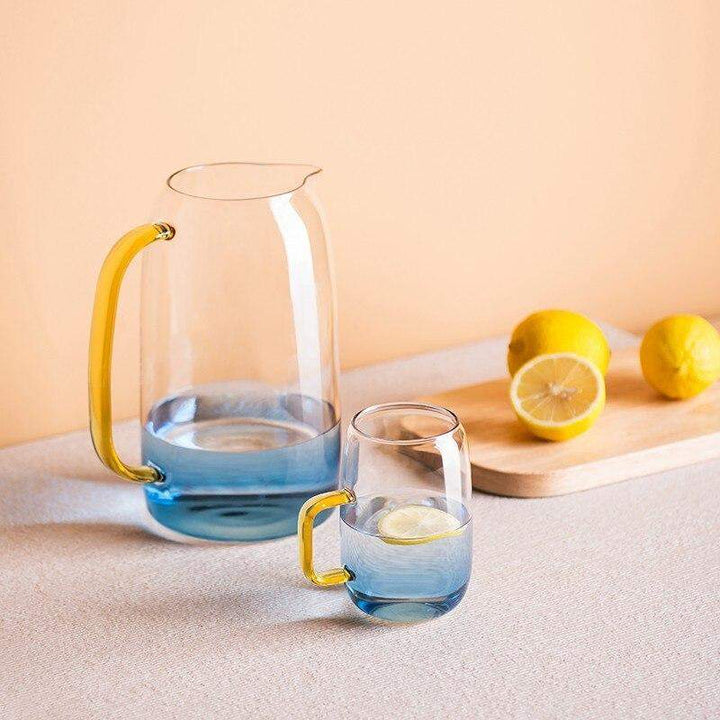 Blue glass pitcher with matching drinking glass Stornfield