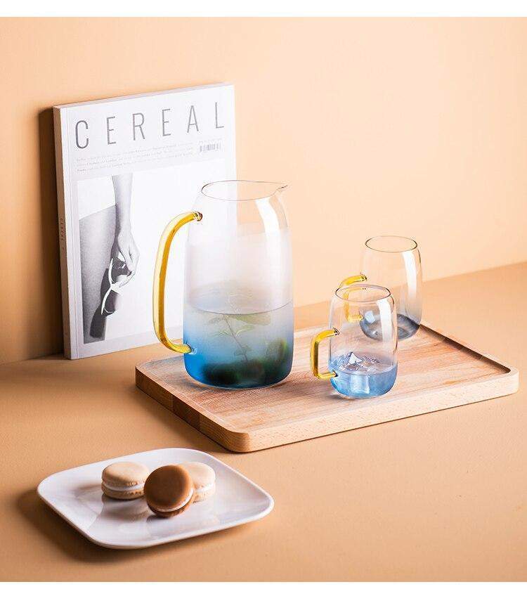 Blue glass pitcher with matching drinking glass Stornfield
