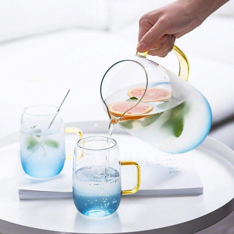 Blue glass pitcher with matching drinking glass Stornfield