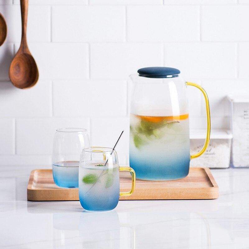 Blue glass pitcher with matching drinking glass Stornfield