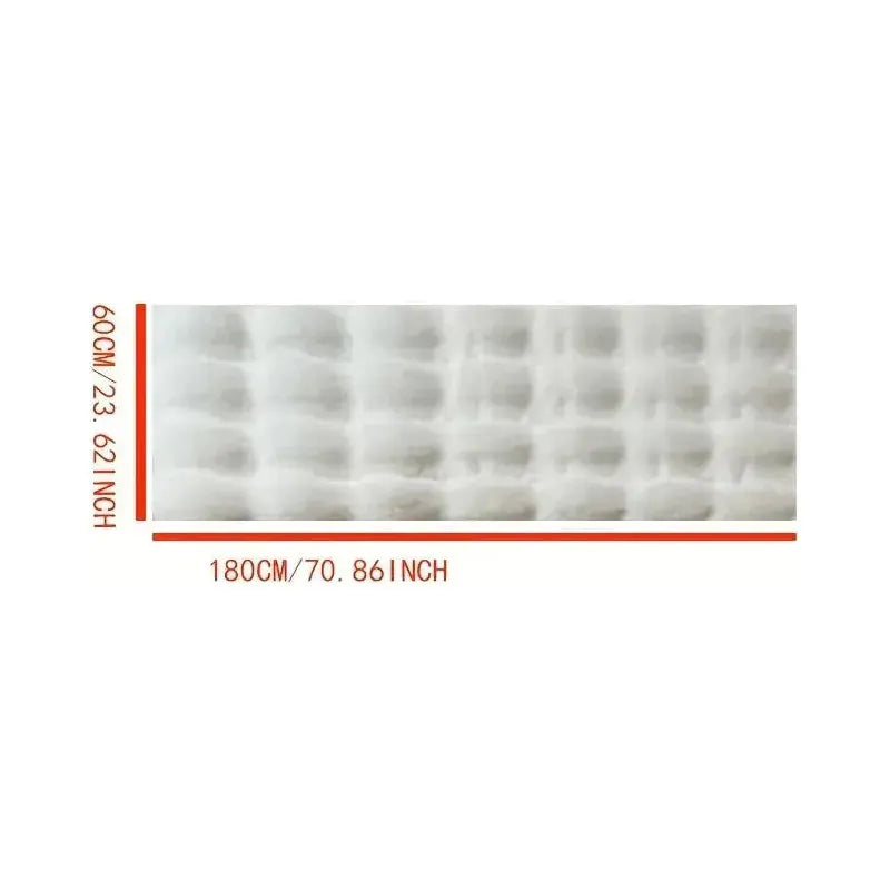 Ultra-soft plush throw with non-slip Stornfield backing