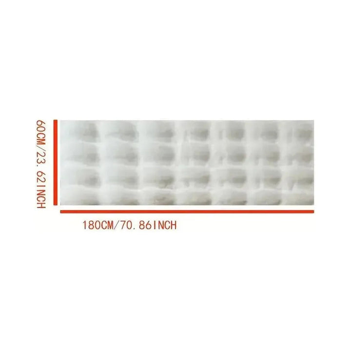Ultra-soft plush throw with non-slip Stornfield backing