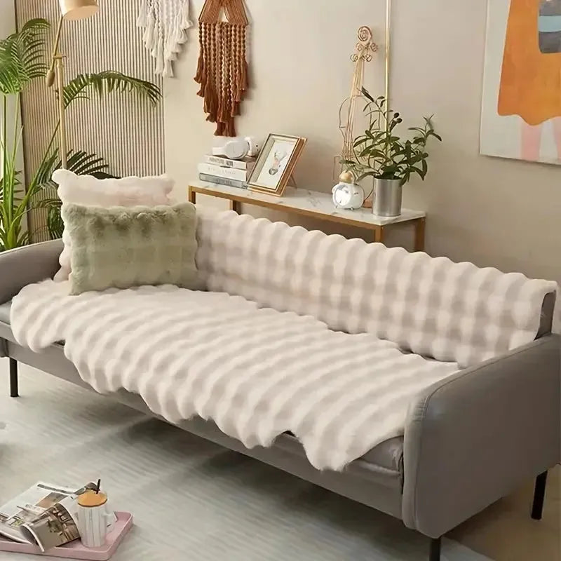Ultra-soft plush throw with non-slip Stornfield backing