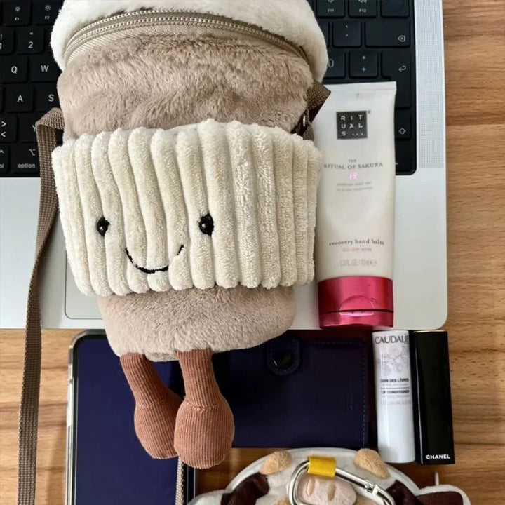 Stornfield | Mignon sac en peluche porte-gobelet heureux