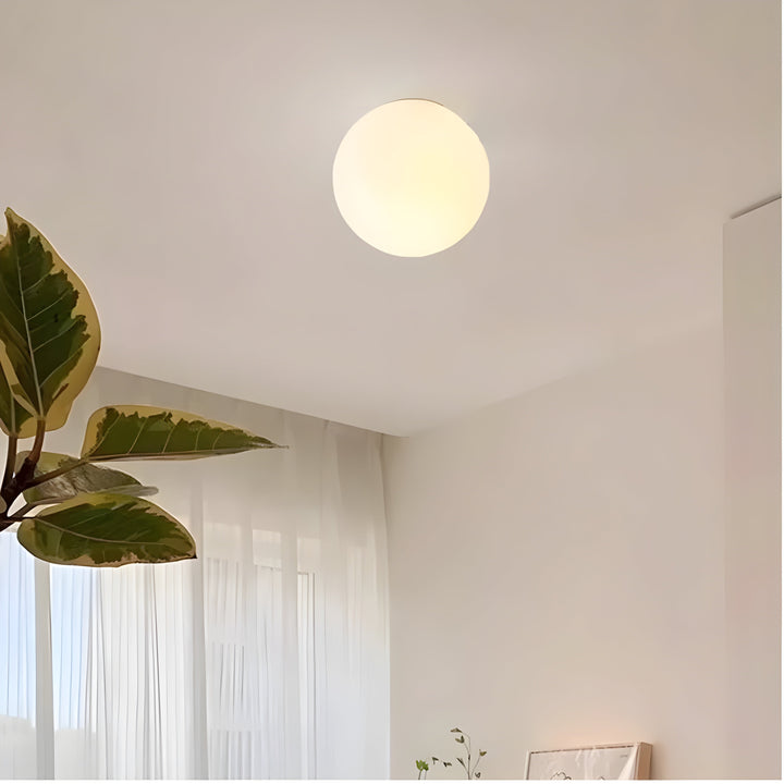 GlasAura Wall Lamp with Matte Glass Ball and Metal Base | Stornfield