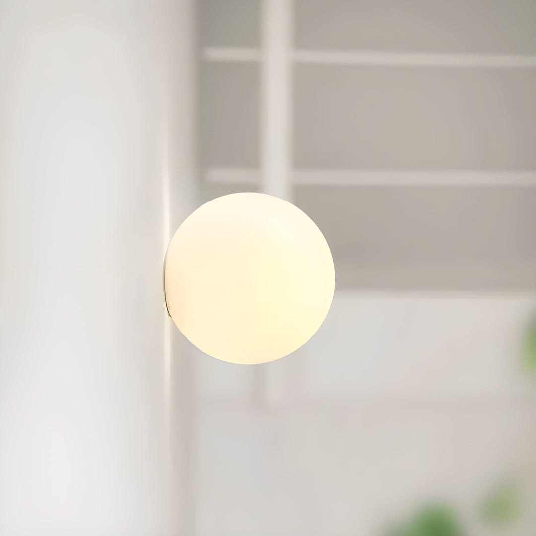 GlasAura Wall Lamp with Matte Glass Ball and Metal Base | Stornfield