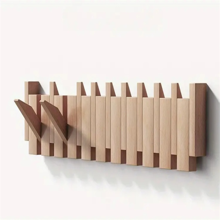 Wooden coat rack in piano design with foldable hooks | Stornfield