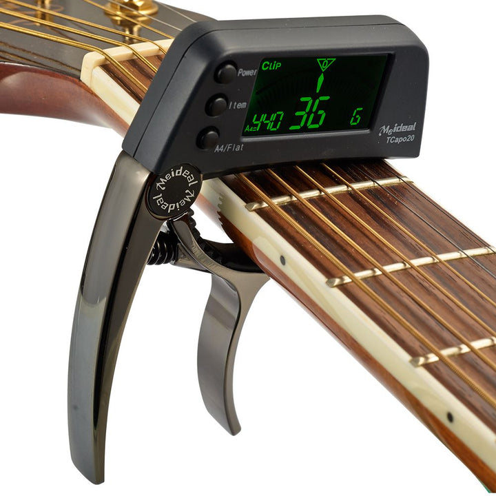 Capo & Tuner "TuneGrip" – 2-in-1 Guitar accessory with LCD screen | Stornfield