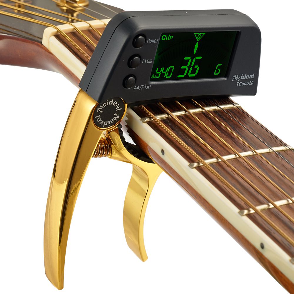 Capo & Tuner "TuneGrip" – 2-in-1 Guitar accessory with LCD screen | Stornfield