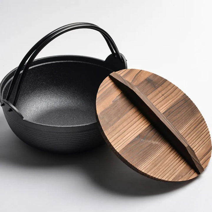 Stornfield | Pre-seasoned pure cast iron wok with flat base and wooden lid