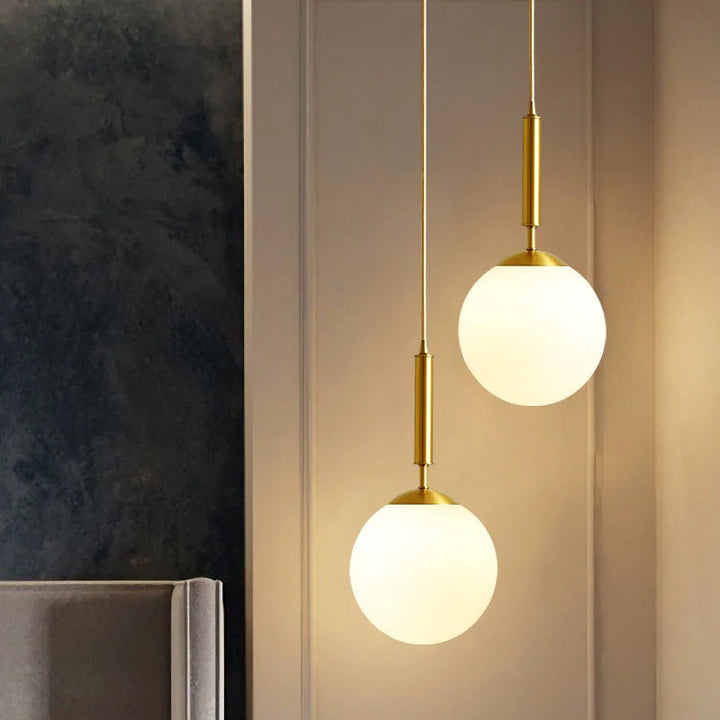 Luxurious pendant lamp in gold – Modern hanging light for staircase or living area | Stornfield
