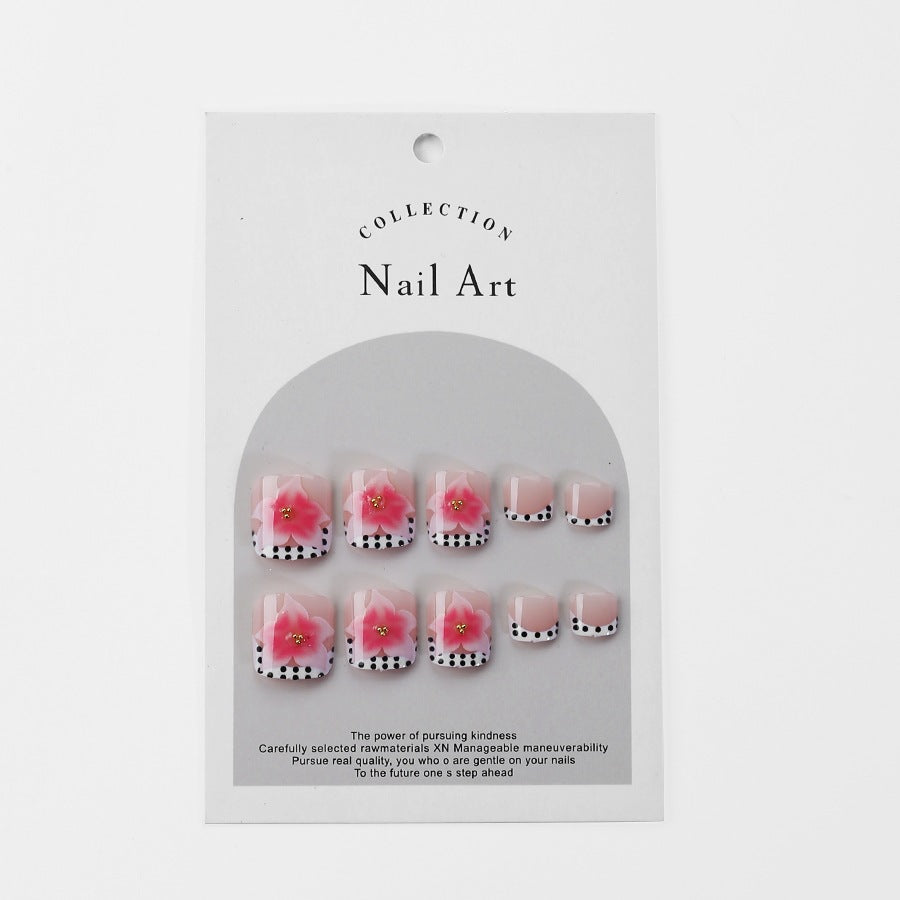 Artificial nail set with elegant flower and dot design Stornfield