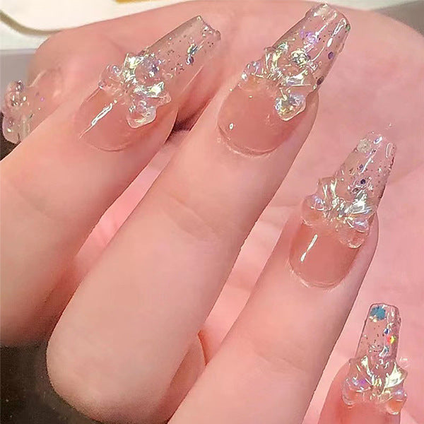 Artificial nails with heart accent and glamorous decorations Stornfield