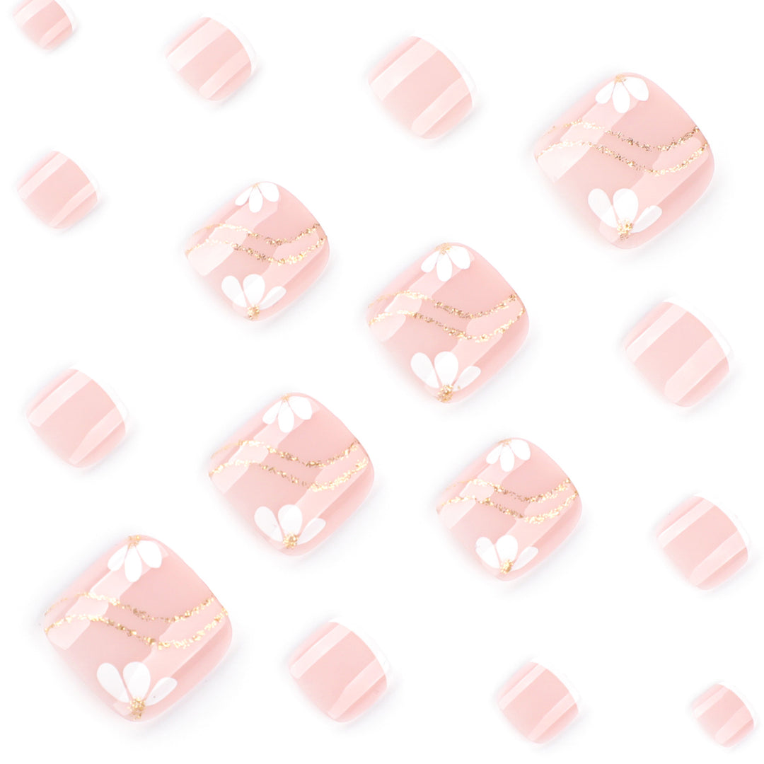 Nail art with elegant blooming designs and glitter accents Stornfield