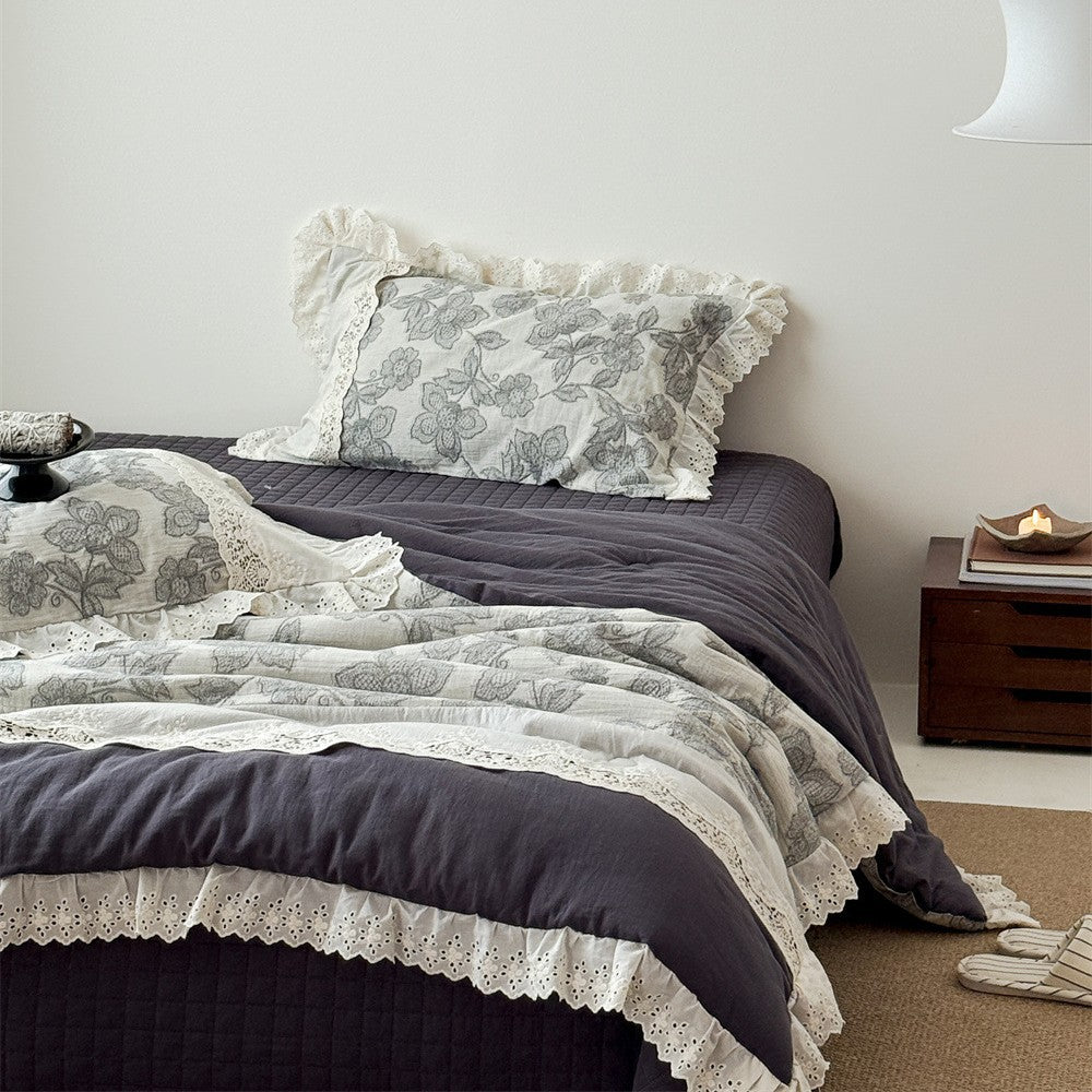 Vintage cotton bedding set with lace trim and hand-drawn floral pattern