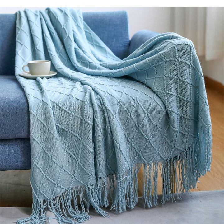 Women’s knitted blanket with textured wave pattern Stornfield