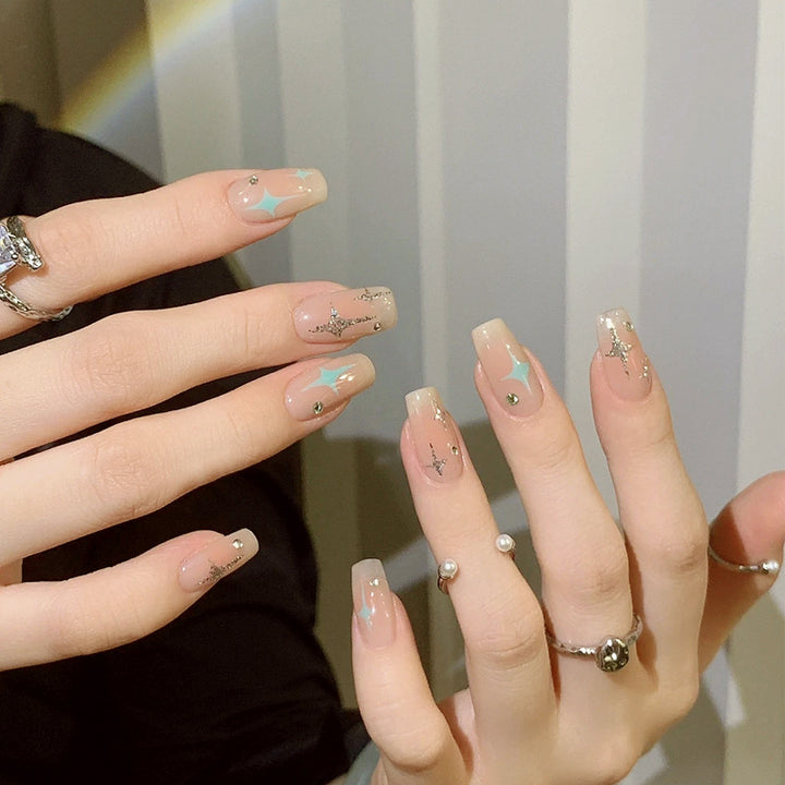 Acrylic nail set with sparkling star and glitter elements Stornfield