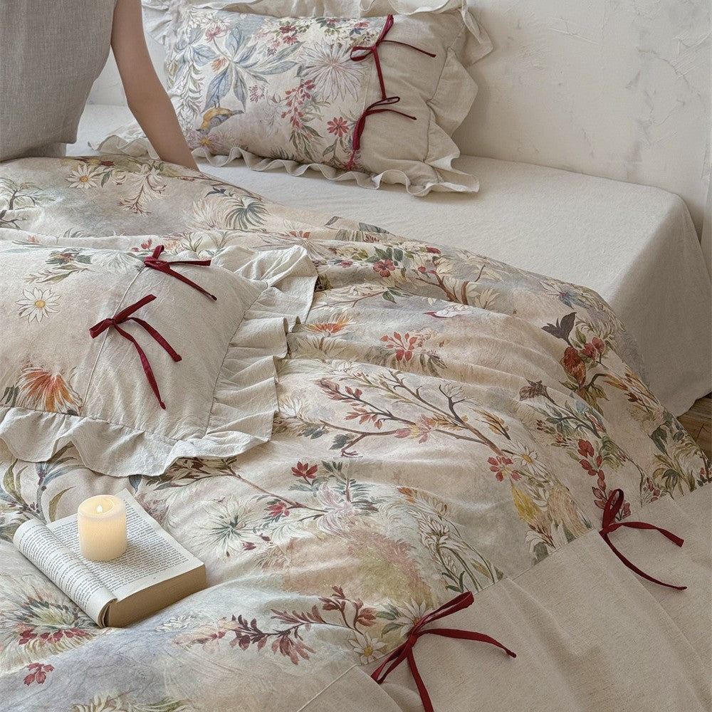 Bedding set with floral vintage linen look, ruffled pillow and bow tie