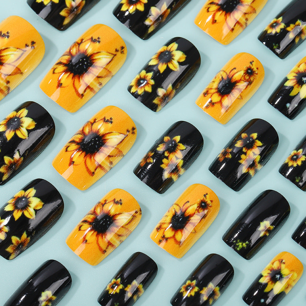 Artificial nails in floral design with sunflower motif Stornfield