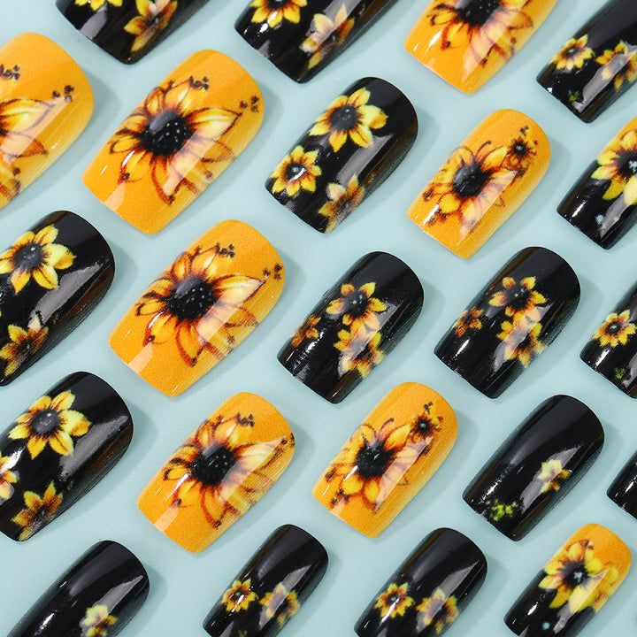 Artificial nails in floral design with sunflower motif Stornfield