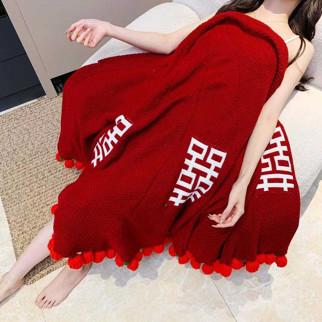 Snuggle blanket with decorative pompom fringes Stornfield