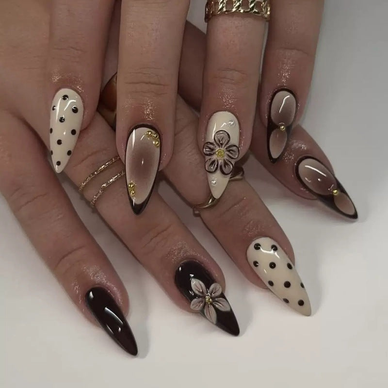 Creative artificial nails with elegant 3D flower accents Stornfield
