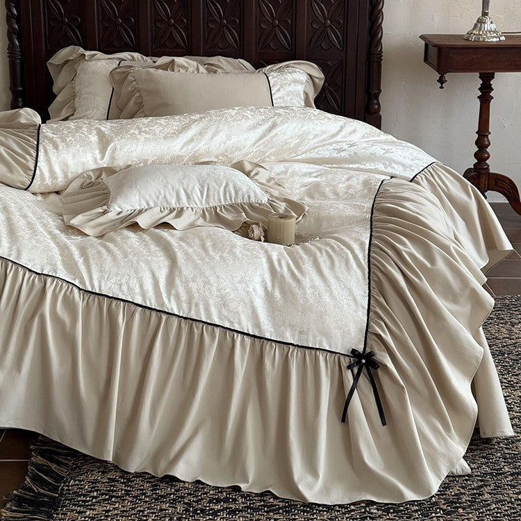 Romantic bed set with frill, jacquard relief and decorative ribbon