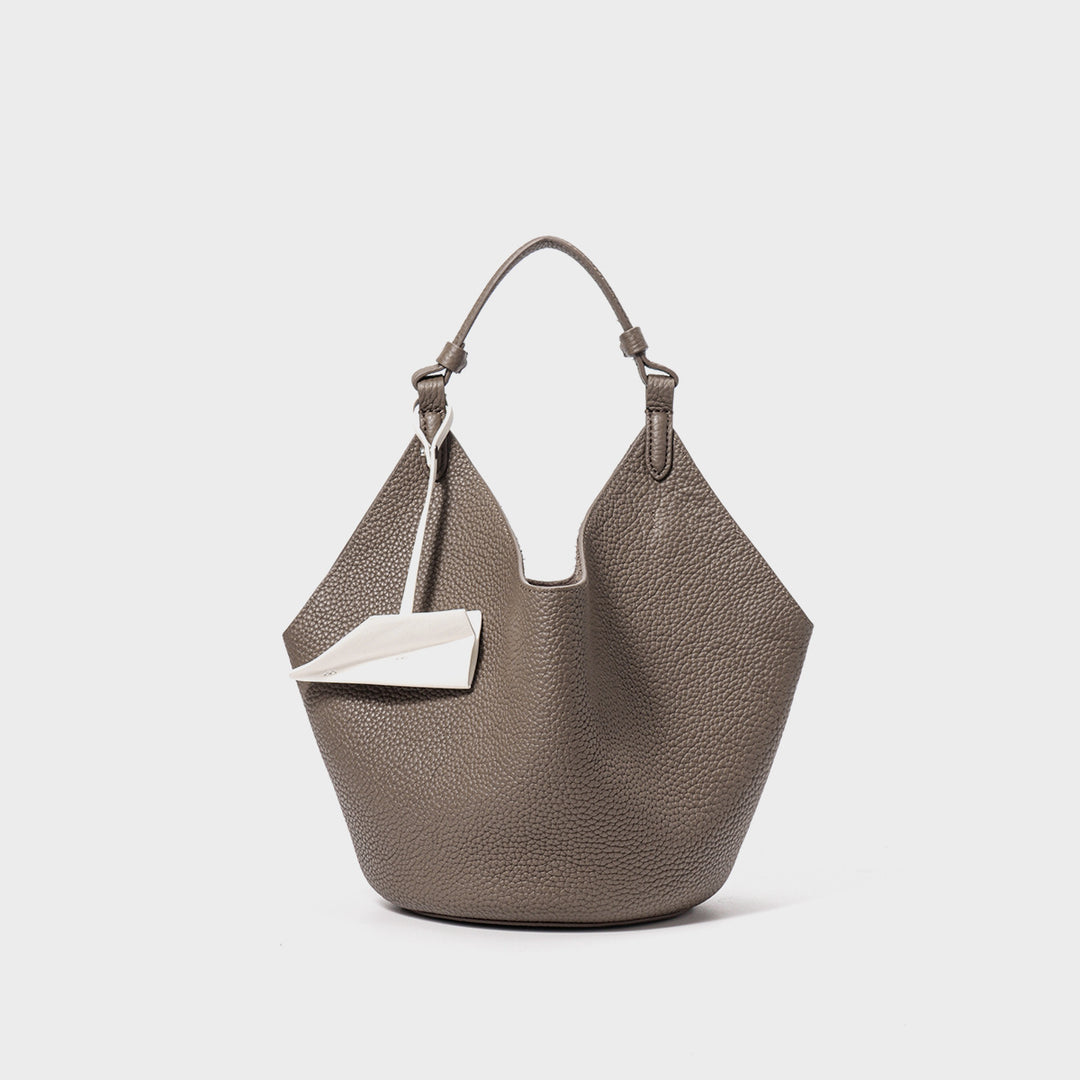 Slouchy Pebbled Leather Hobo Bucket Bag with Top Handle and Geometric Silhouette