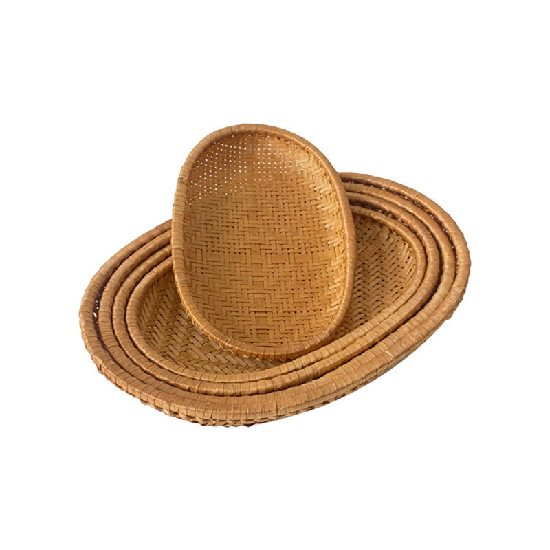 Women oval serving basket made of handwoven natural material Stornfield