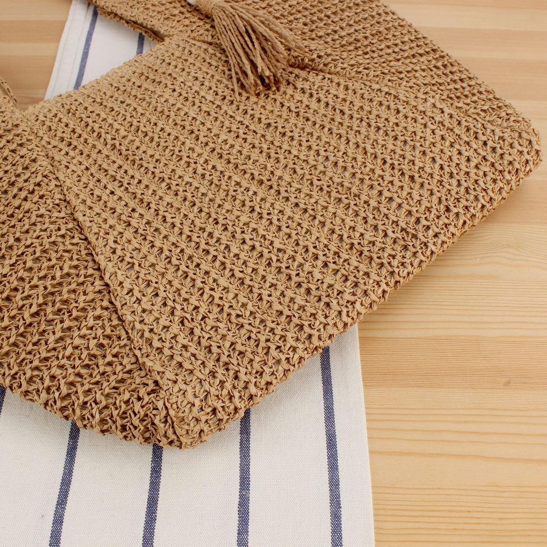 Handbag Made of Handwoven Raffia with Elegant Leather Accents Stornfield