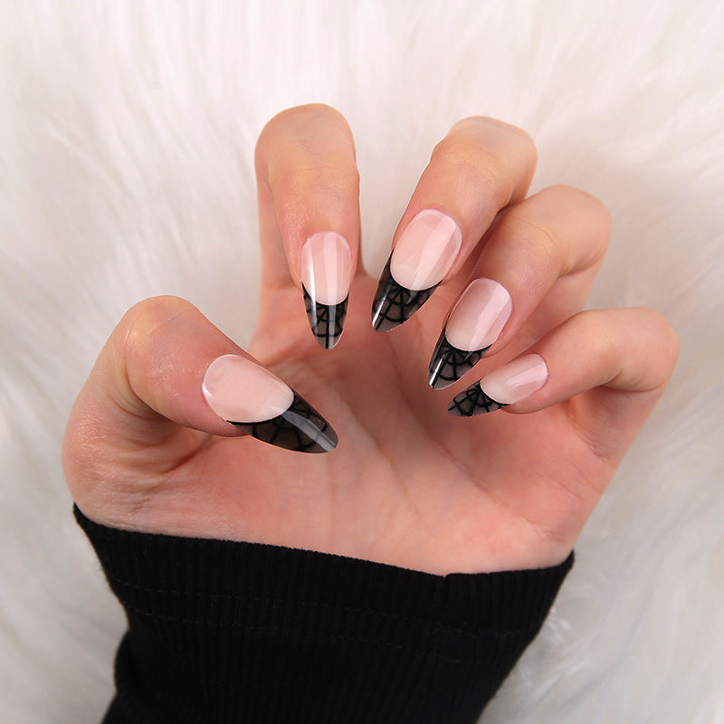 Artful nail tips with elegant spider web pattern Stornfield