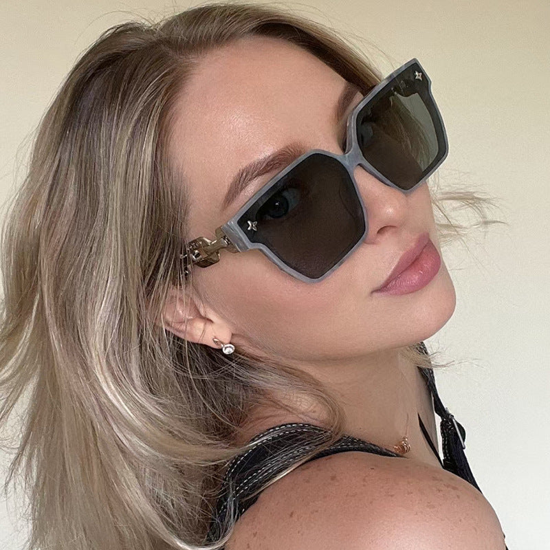 Ladies fashionable oversized sunglasses with combined frame Stornfield