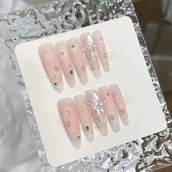 Glamorous artificial nails with sparkling accents Stornfield