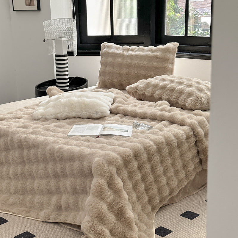 Padded microfiber mattress topper with wave stitching and plush surface