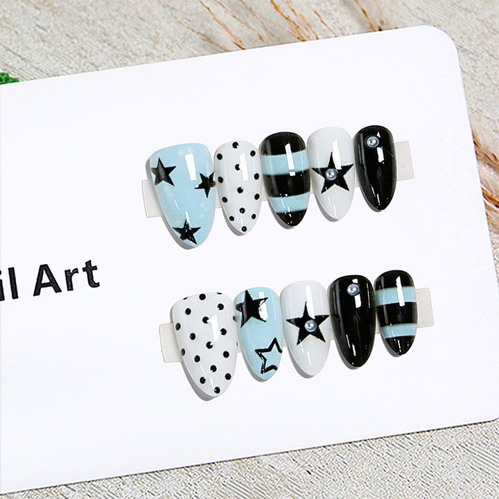 Artificial nails with trendy star and dot designs Stornfield