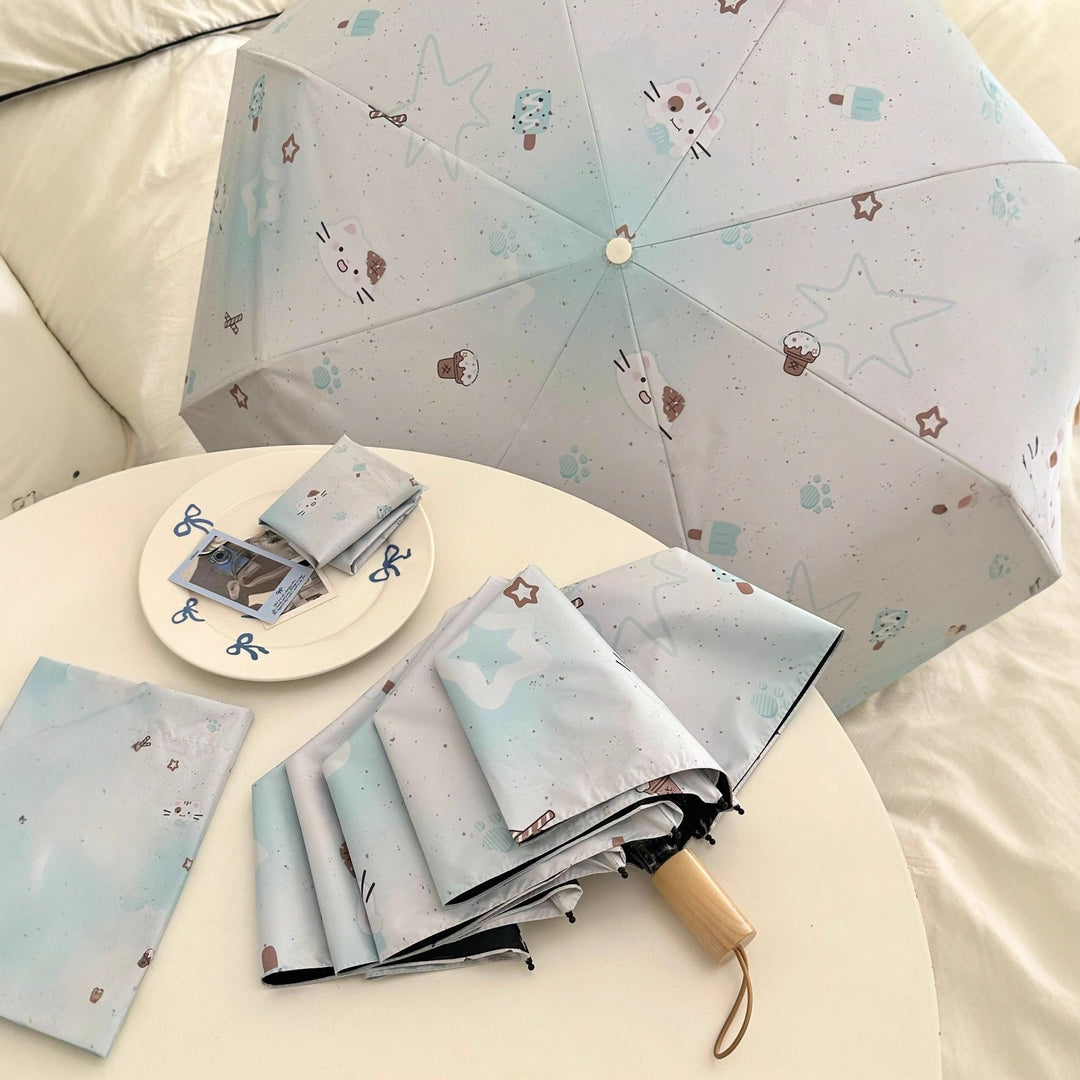 Women's compact folding umbrella with cute Stornfield motif