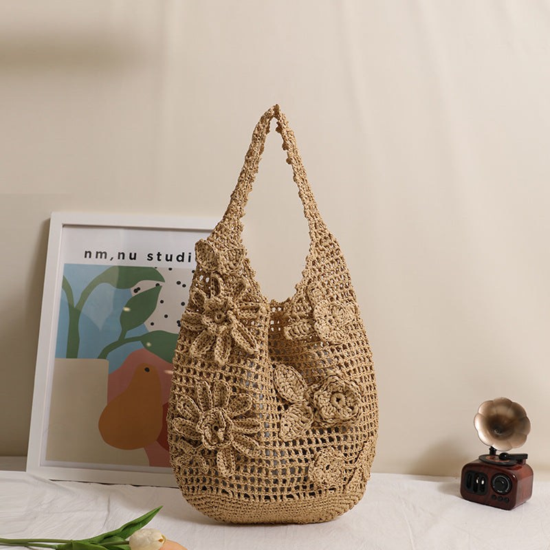 Crocheted shoulder bag with floral appliqués Stornfield