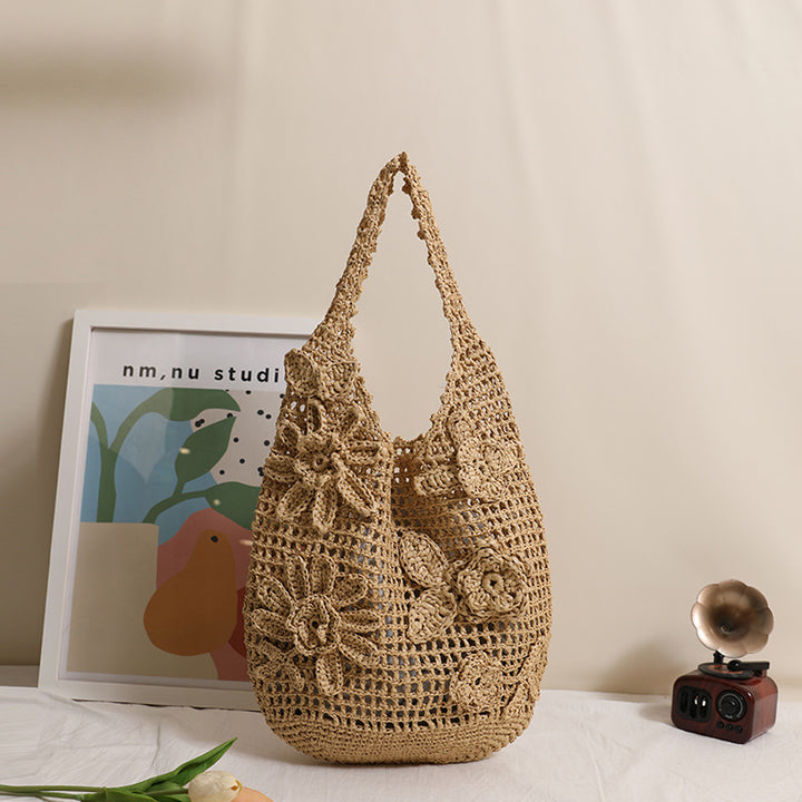 Crocheted shoulder bag with floral appliqués Stornfield