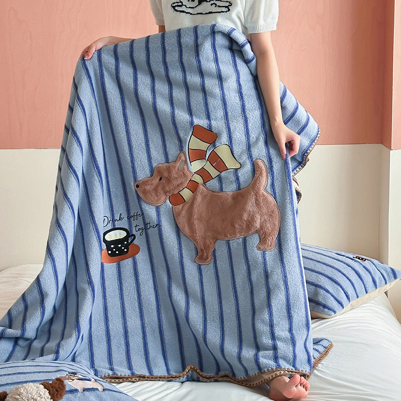 Plaid blanket checkered with appliqued animal motifs and soft velour lining
