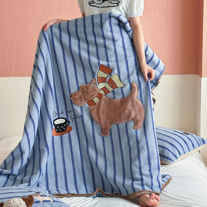 Plaid blanket checkered with appliqued animal motifs and soft velour lining