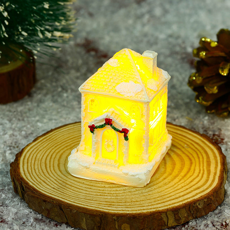 Illuminated Christmas village house with festive decoration Stornfield