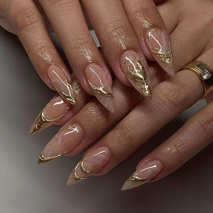 Artful Nail Extensions with Fine Golden Accents Stornfield