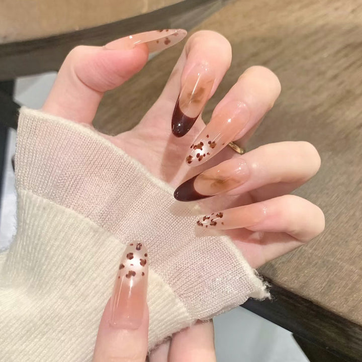 Artistic Stiletto Press-On Nails with Unique Animal Print Accents Stornfield