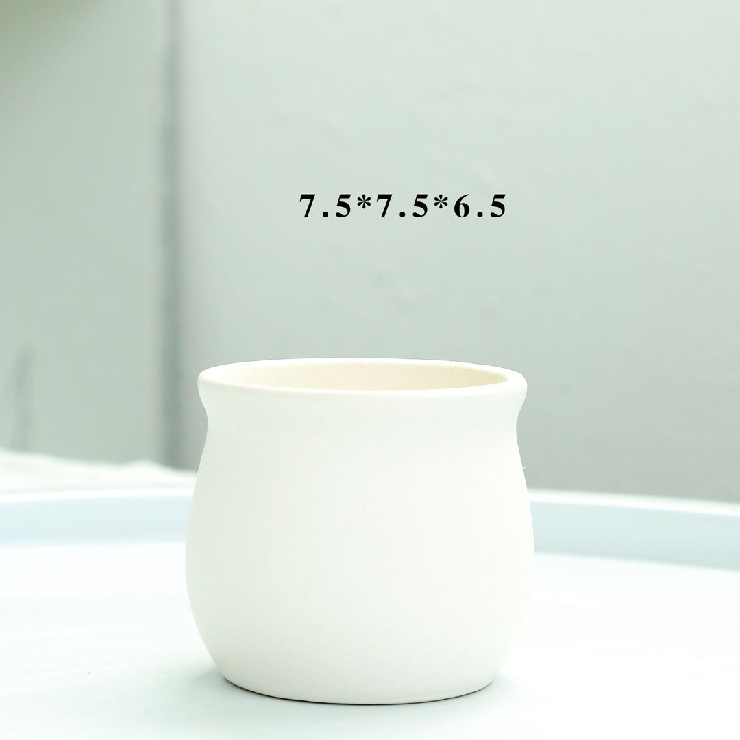 Modern Round Ceramic Planter Stornfeild
