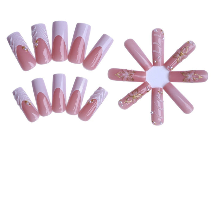 Acrylic nails with luxurious flower design and elegant accents Stornfield