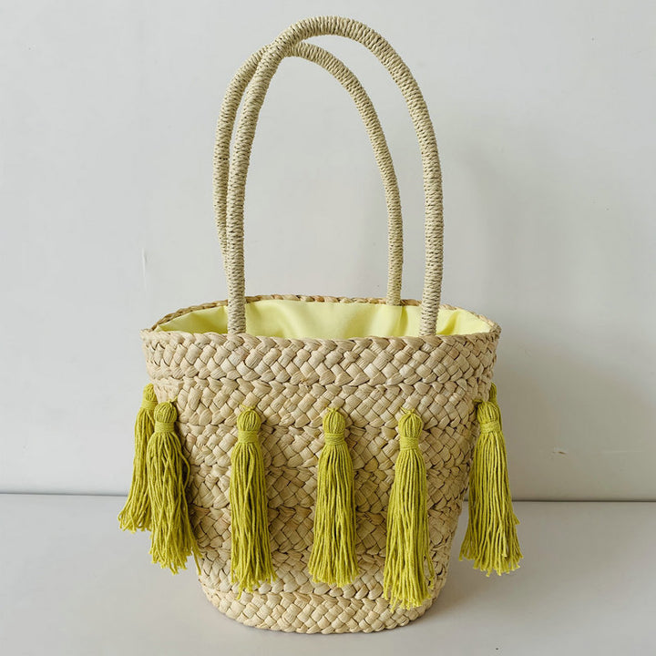 Trendy basket bag with tassels Stornfield
