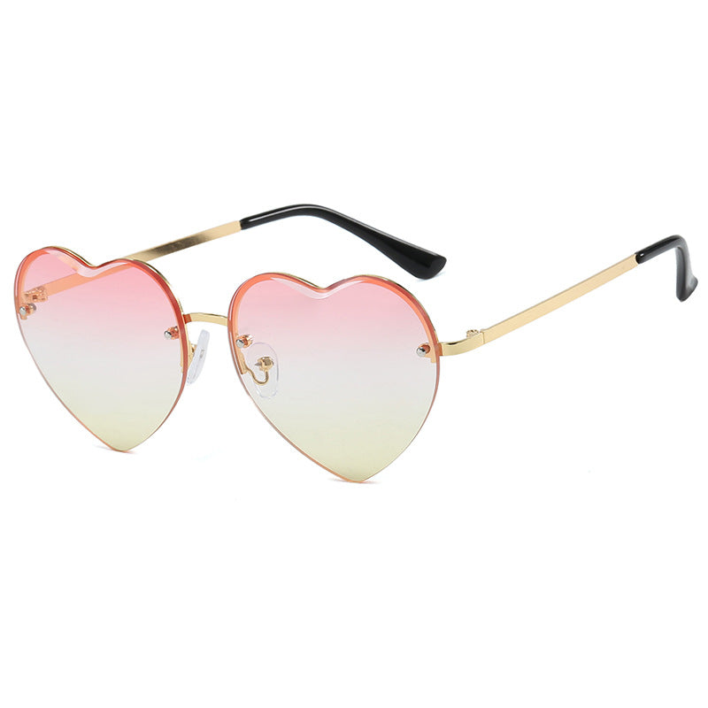 Women's Heart-Shaped Sunglasses with Mirrored Lenses and Fashionable Metal Frame Stornfield