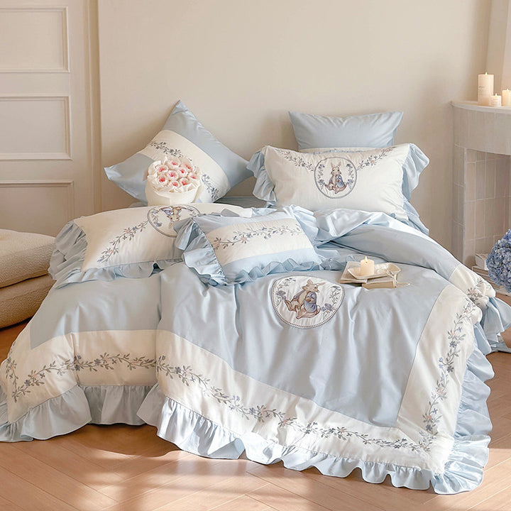 Bedding set with romantic ruffle edge and delicate embroidery