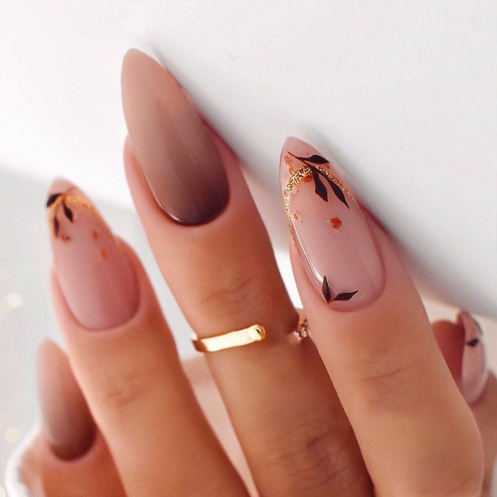Artificial nail creation with glamorous tips and glitter details Stornfield